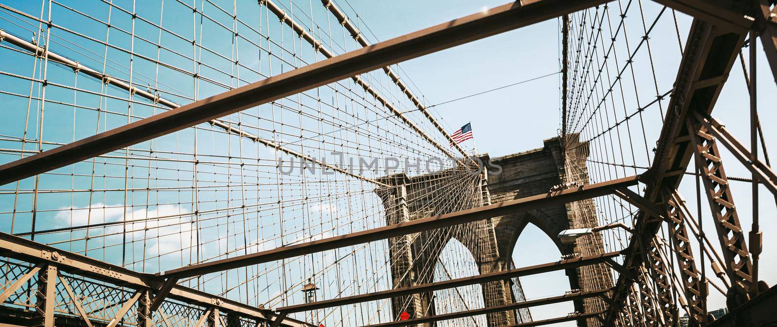 Brooklyn Bridge is a hybrid cable-stayed suspension bridge in New York City and is one of the oldest bridges of either type in the United States