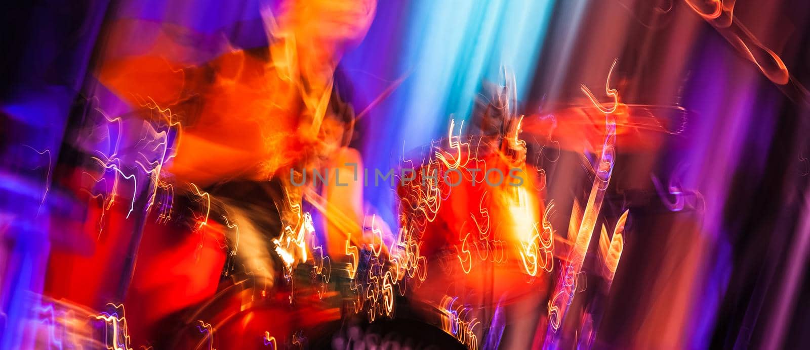 Musician with drums. Abstract image of a drummer at concert. The Sound of Music concept. Intentional motion blur