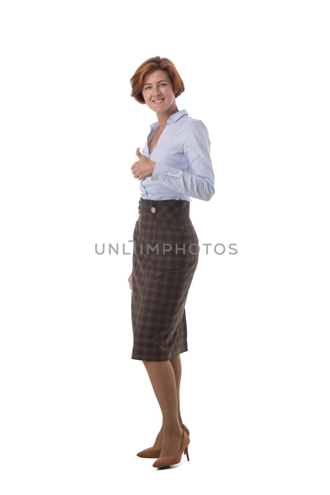 Full length portrait of young business woman with thumb up studio isolated on white background, business people