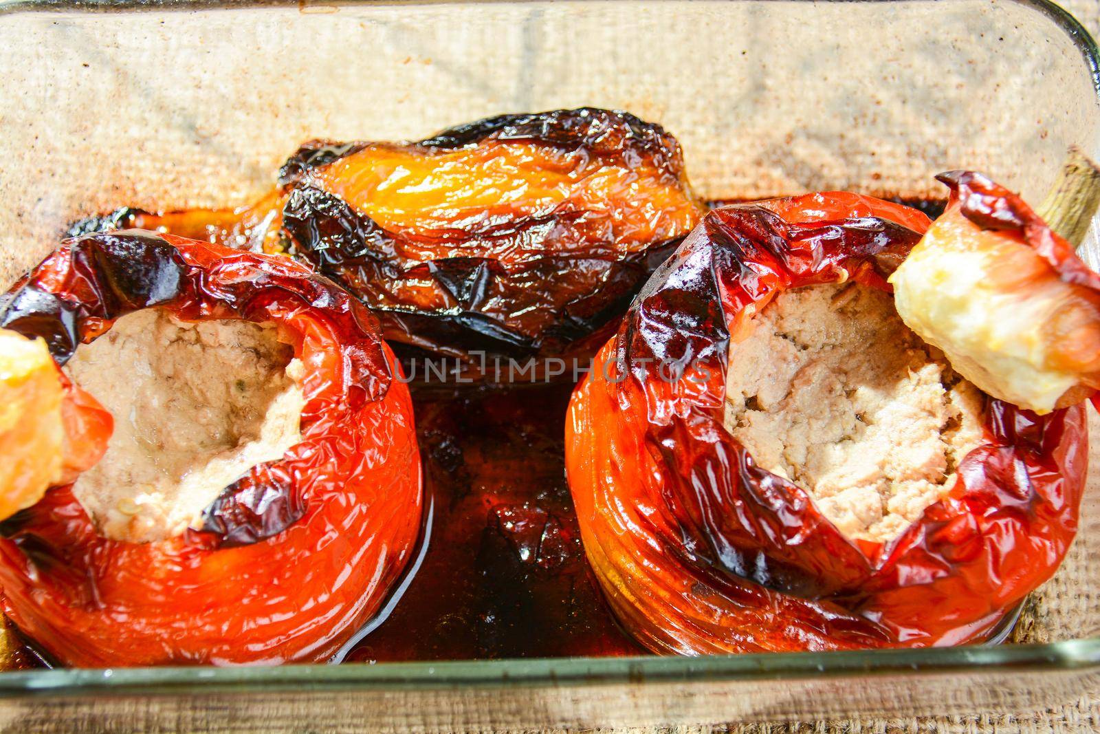 Italian cuisine, baked stuffed peppers with tuna capers and Parmesan cheese