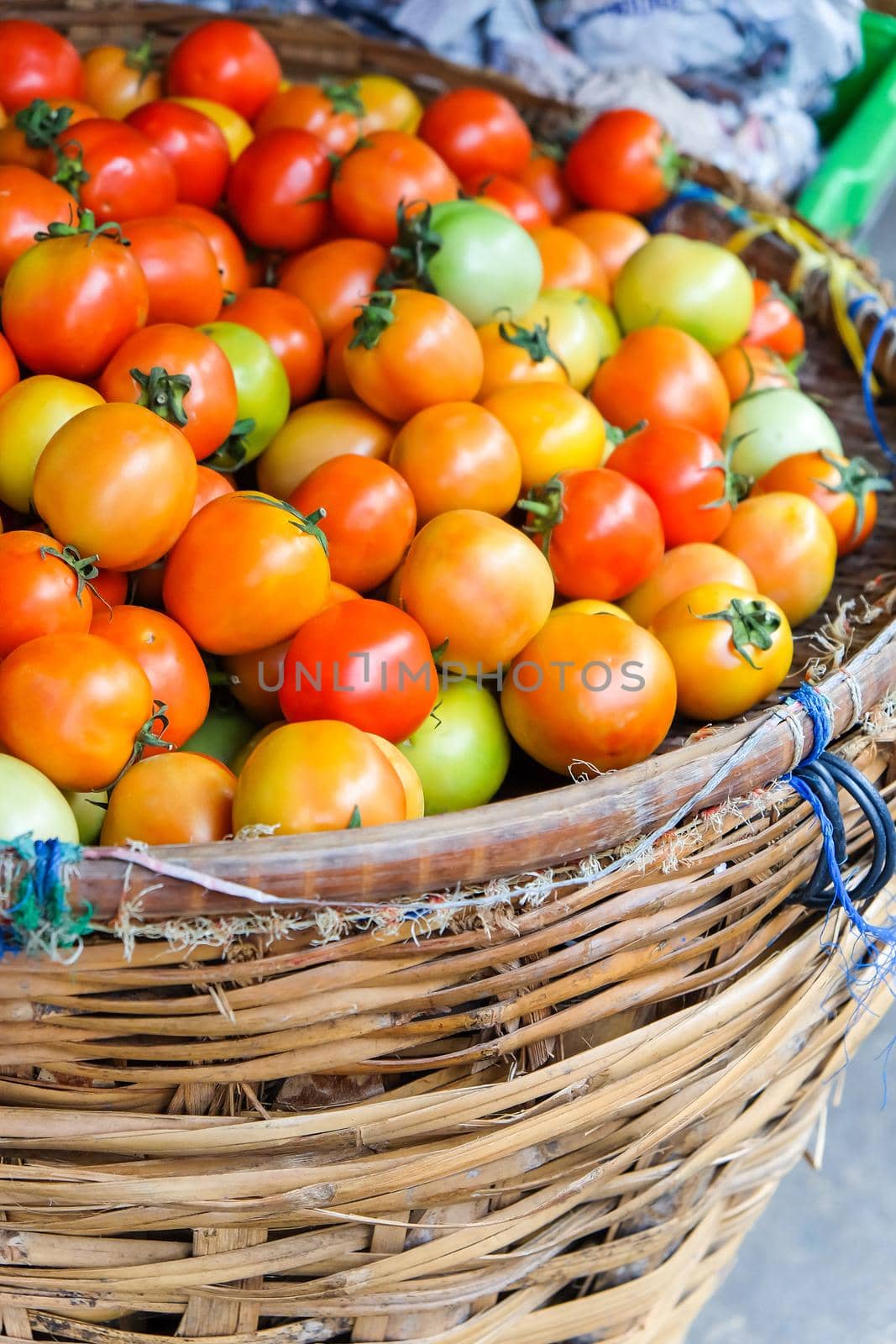 Ripe Tomatoes on street market by ponsulak