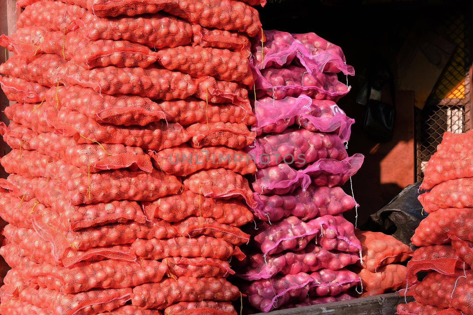 Stack of garlic and Shallot in market