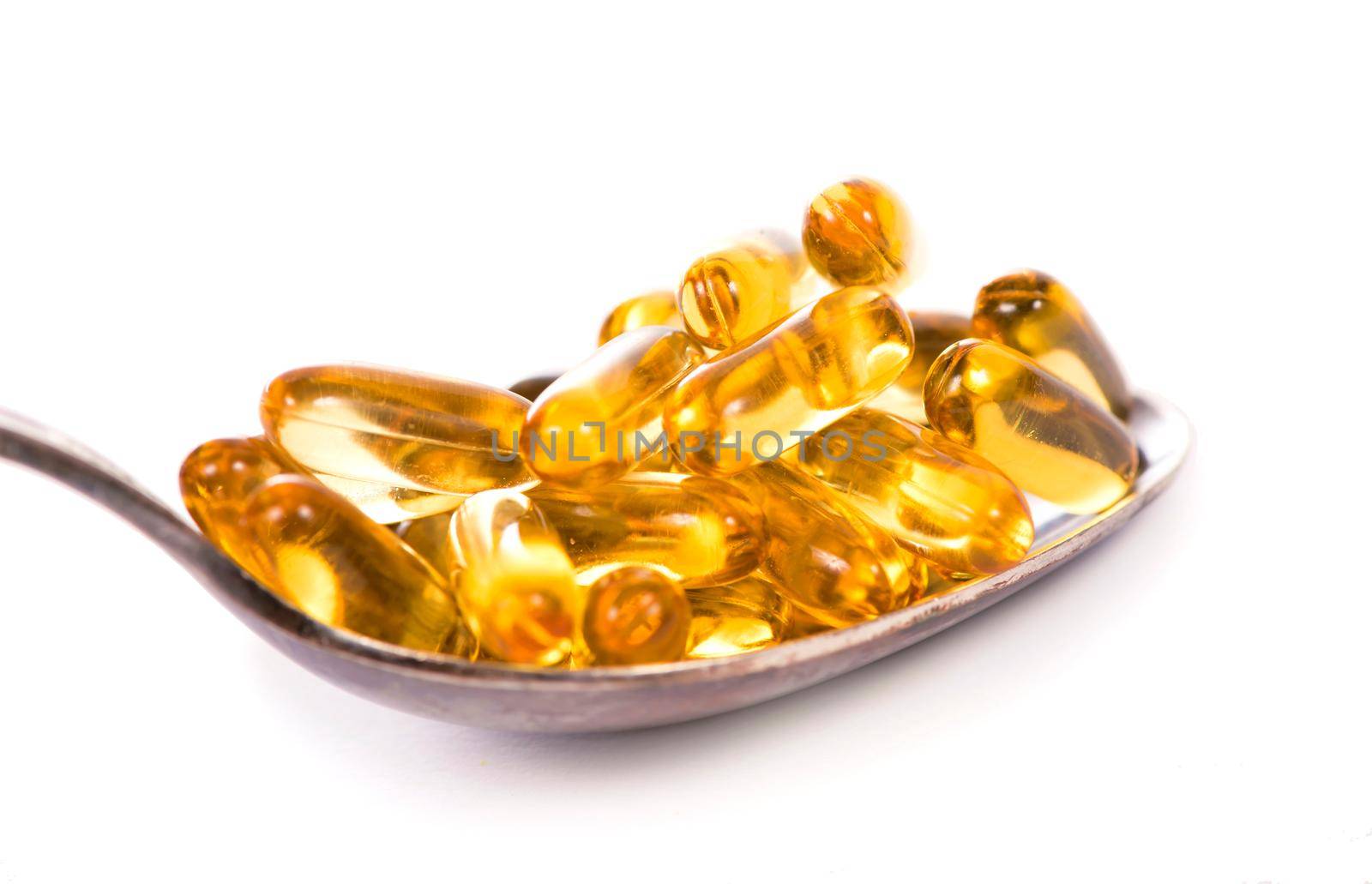 Omega 3 pills ,Fish oil capsules with omega 3 and vitamin D on white background.