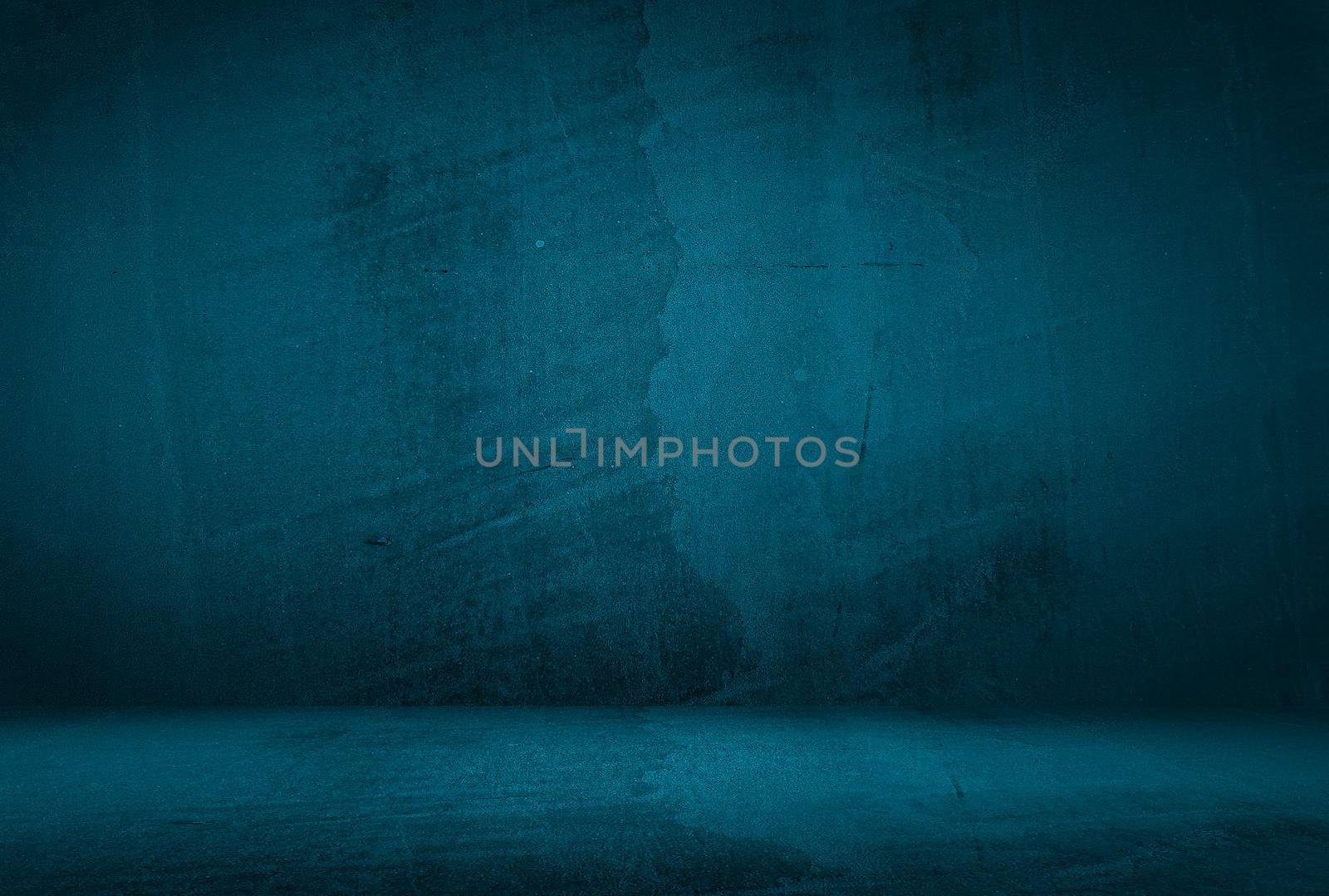 Vintage grunge blue concrete texture studio wall background with vignette