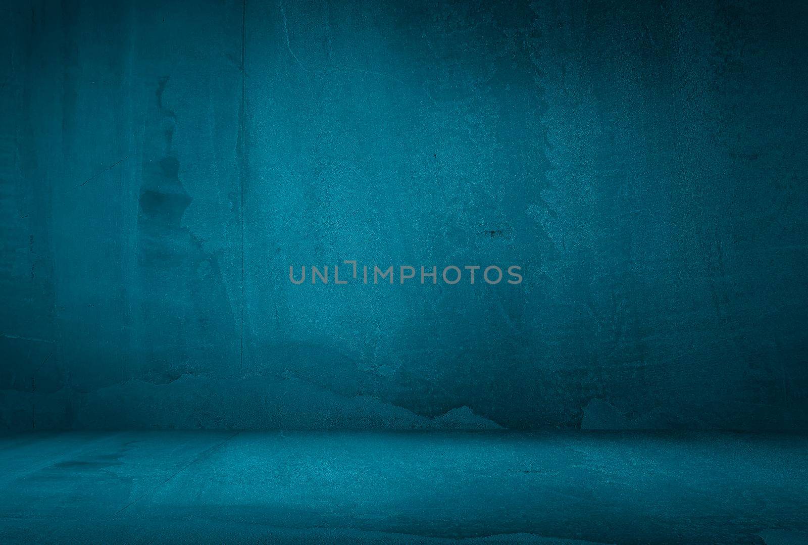 Vintage grunge blue concrete texture studio wall background with vignette