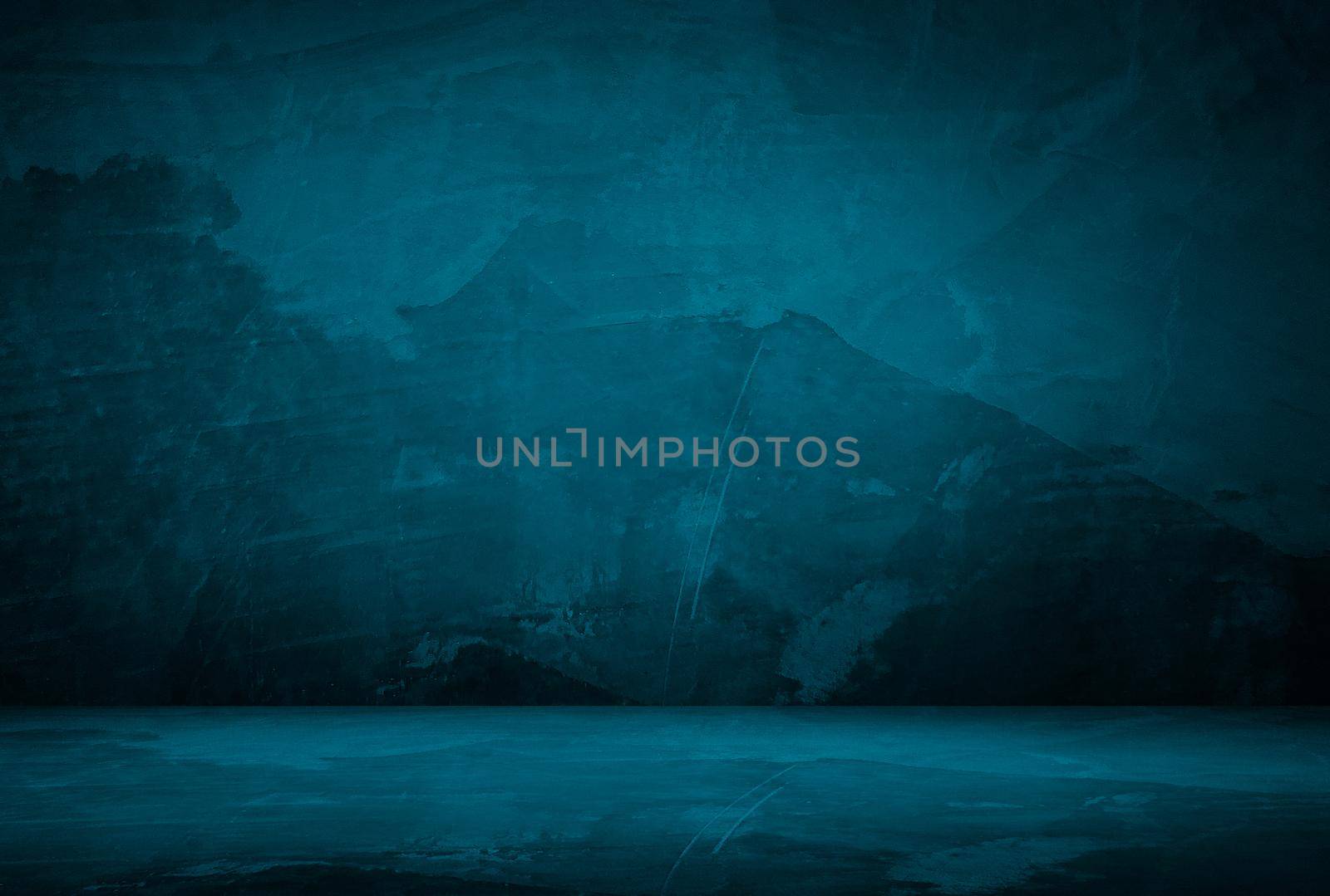 Vintage grunge blue concrete texture studio wall background with vignette. by Benzoix