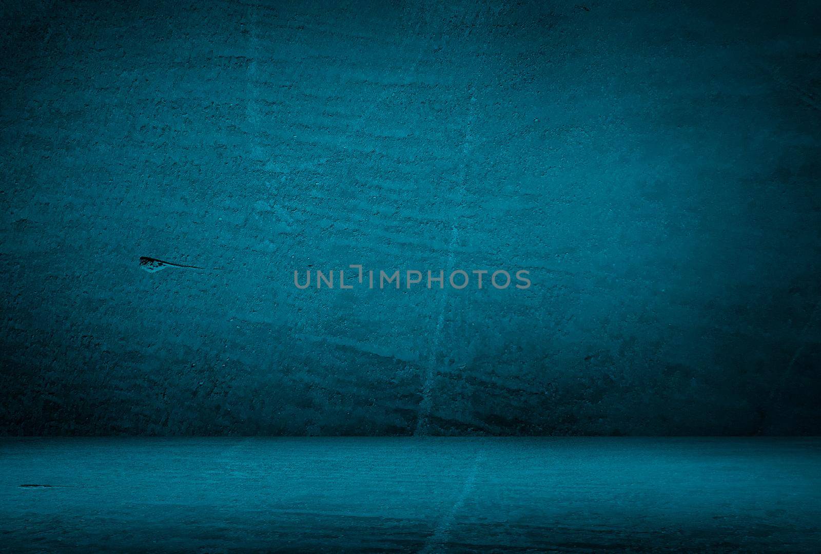 Vintage grunge blue concrete texture studio wall background with vignette. by Benzoix