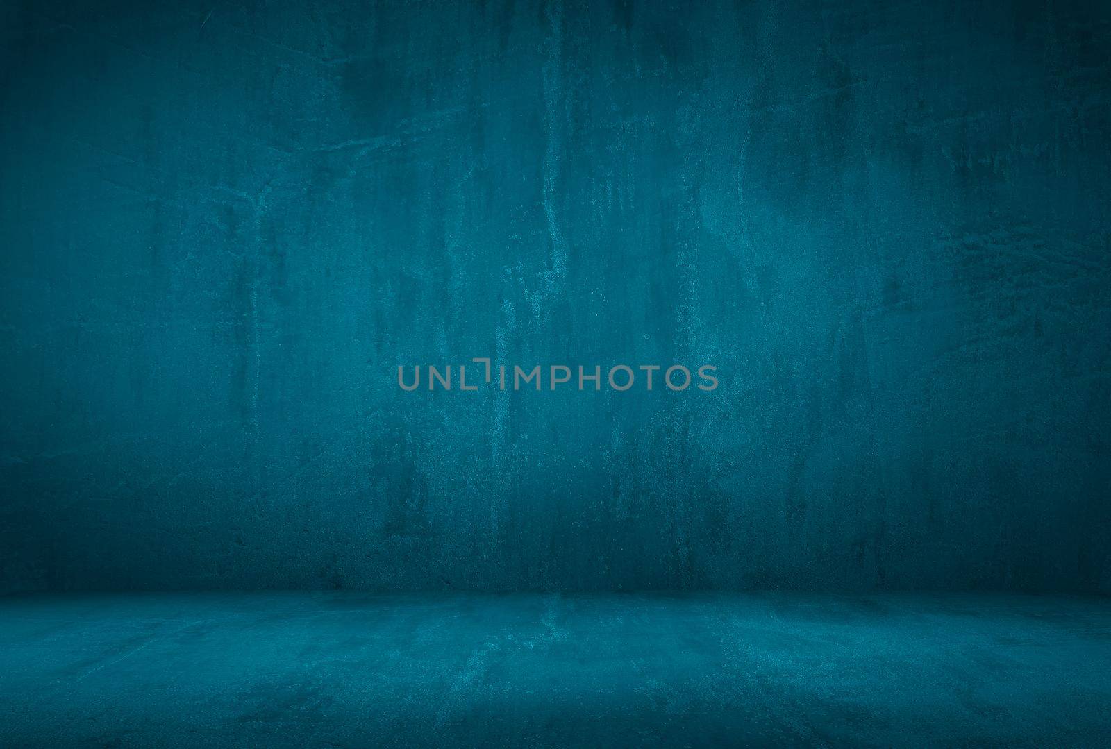 Vintage grunge blue concrete texture studio wall background with vignette