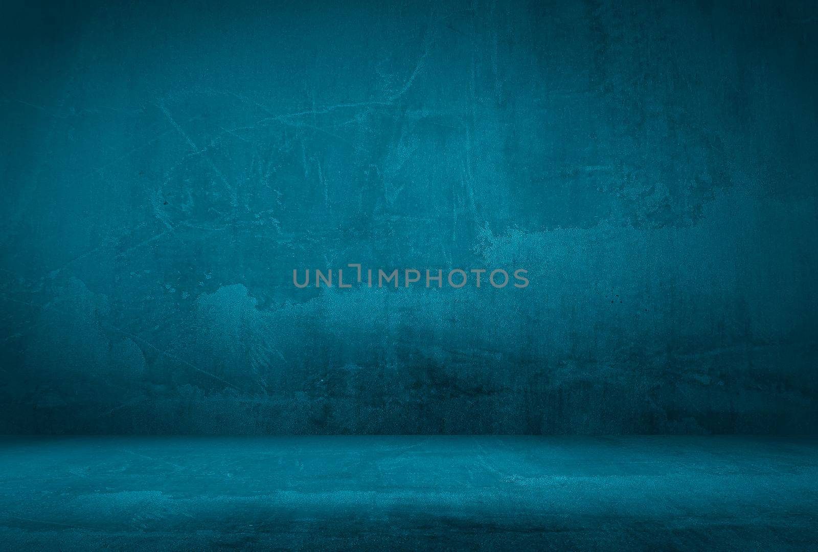 Vintage grunge blue concrete texture studio wall background with vignette