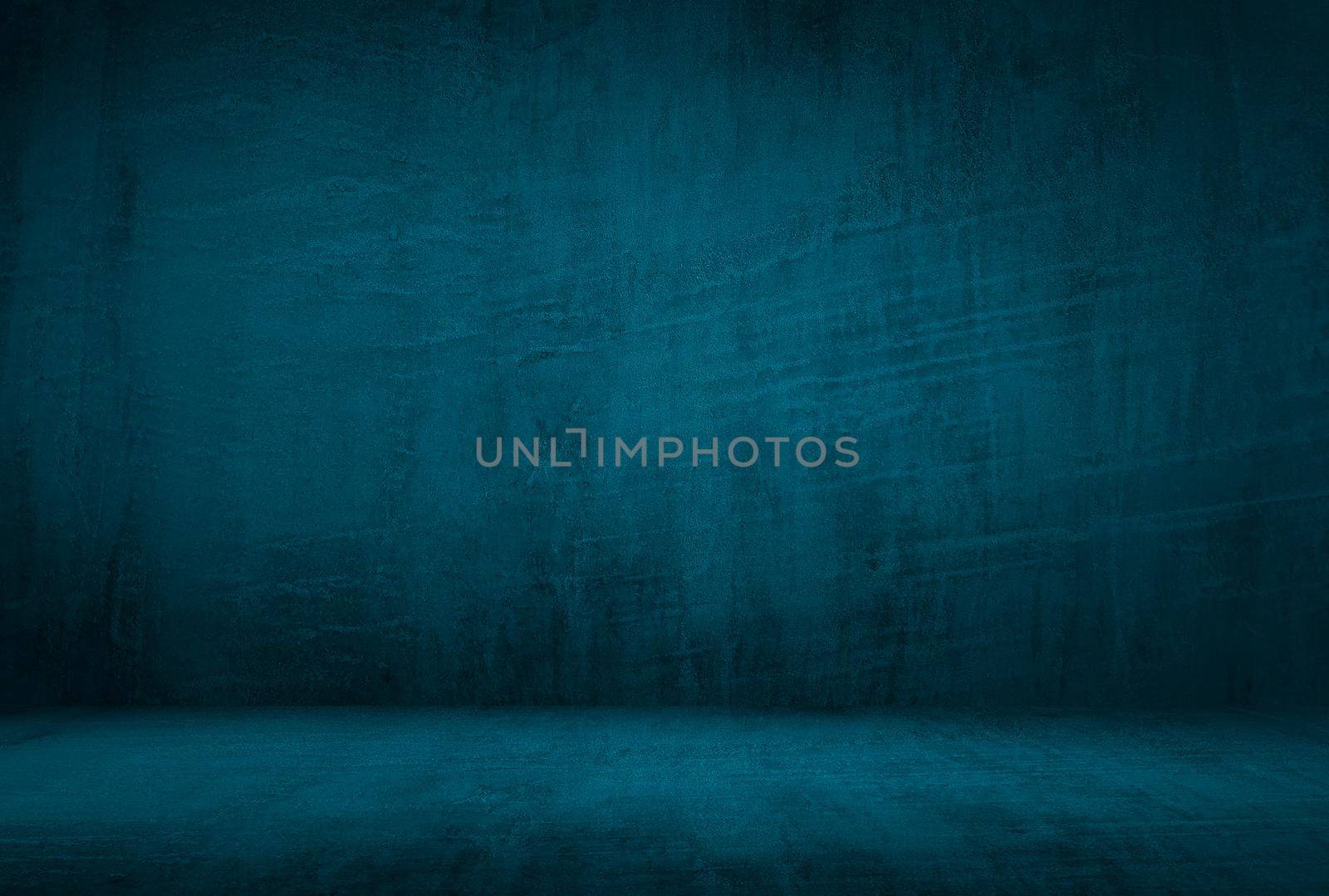 Vintage grunge blue concrete texture studio wall background with vignette. by Benzoix