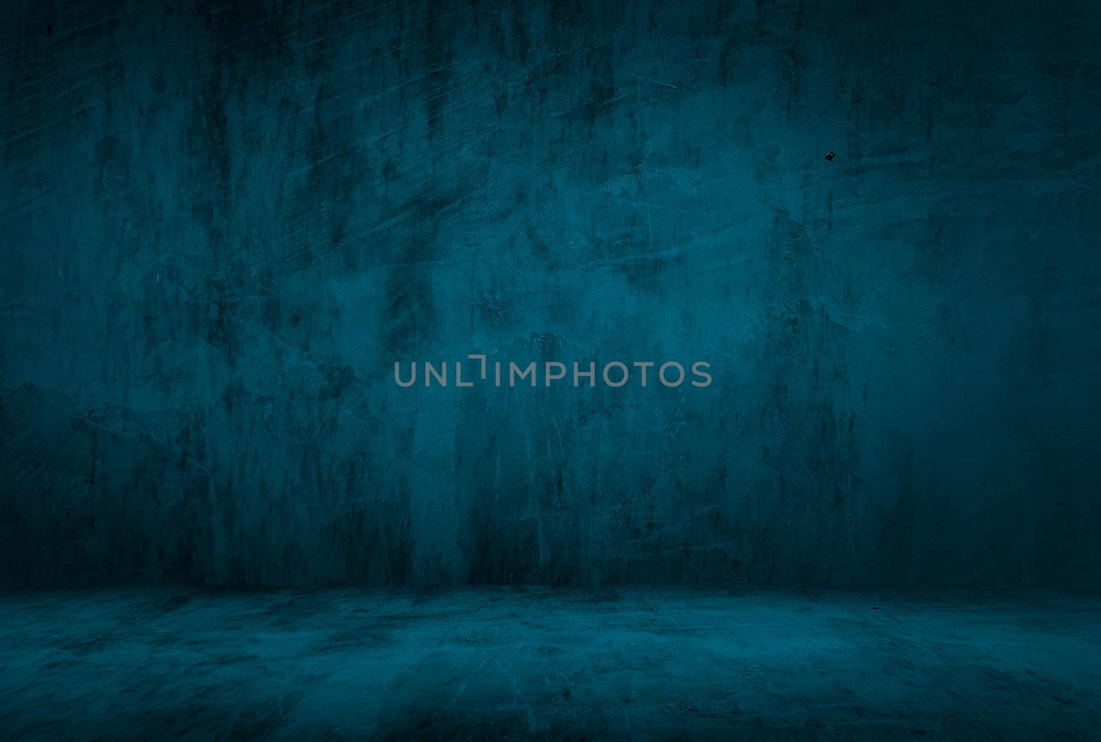 Vintage grunge blue concrete texture studio wall background with vignette. by Benzoix