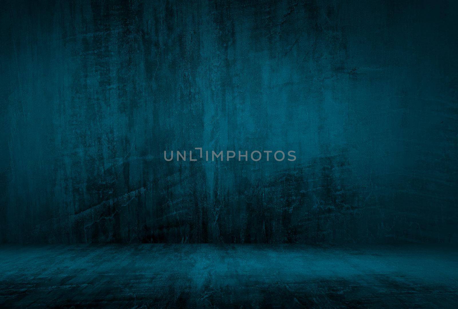 Vintage grunge blue concrete texture studio wall background with vignette