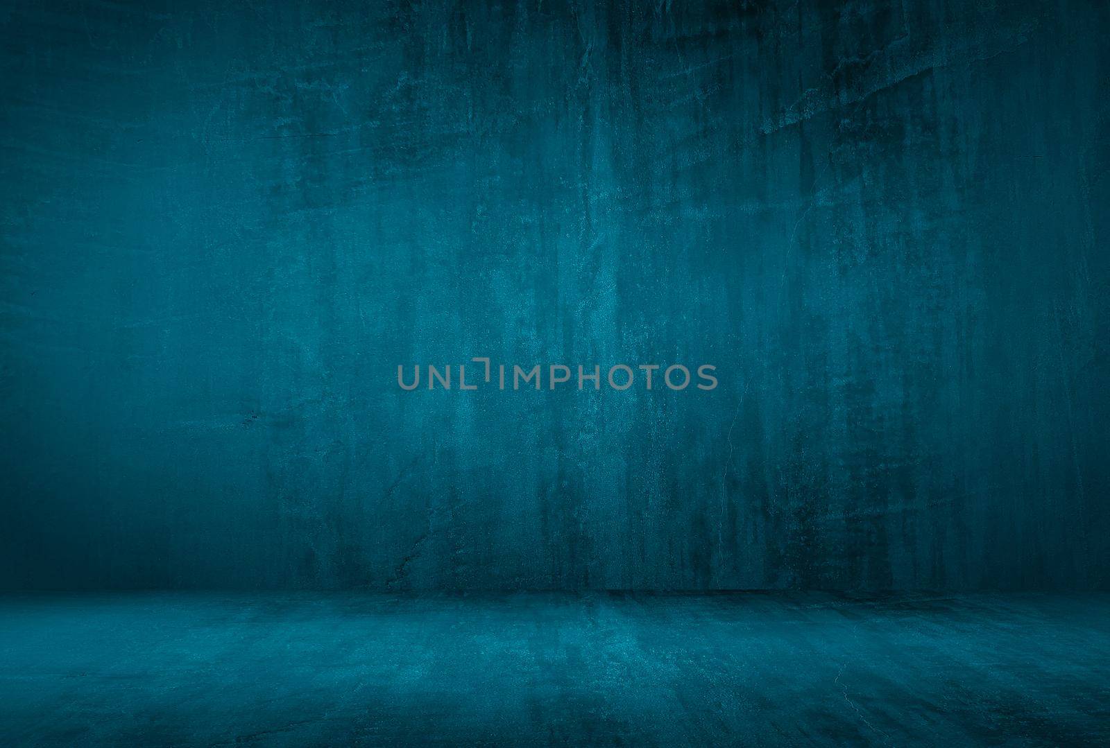 Vintage grunge blue concrete texture studio wall background with vignette