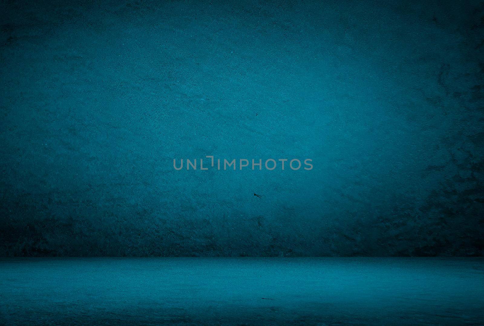 Vintage grunge blue concrete texture studio wall background with vignette