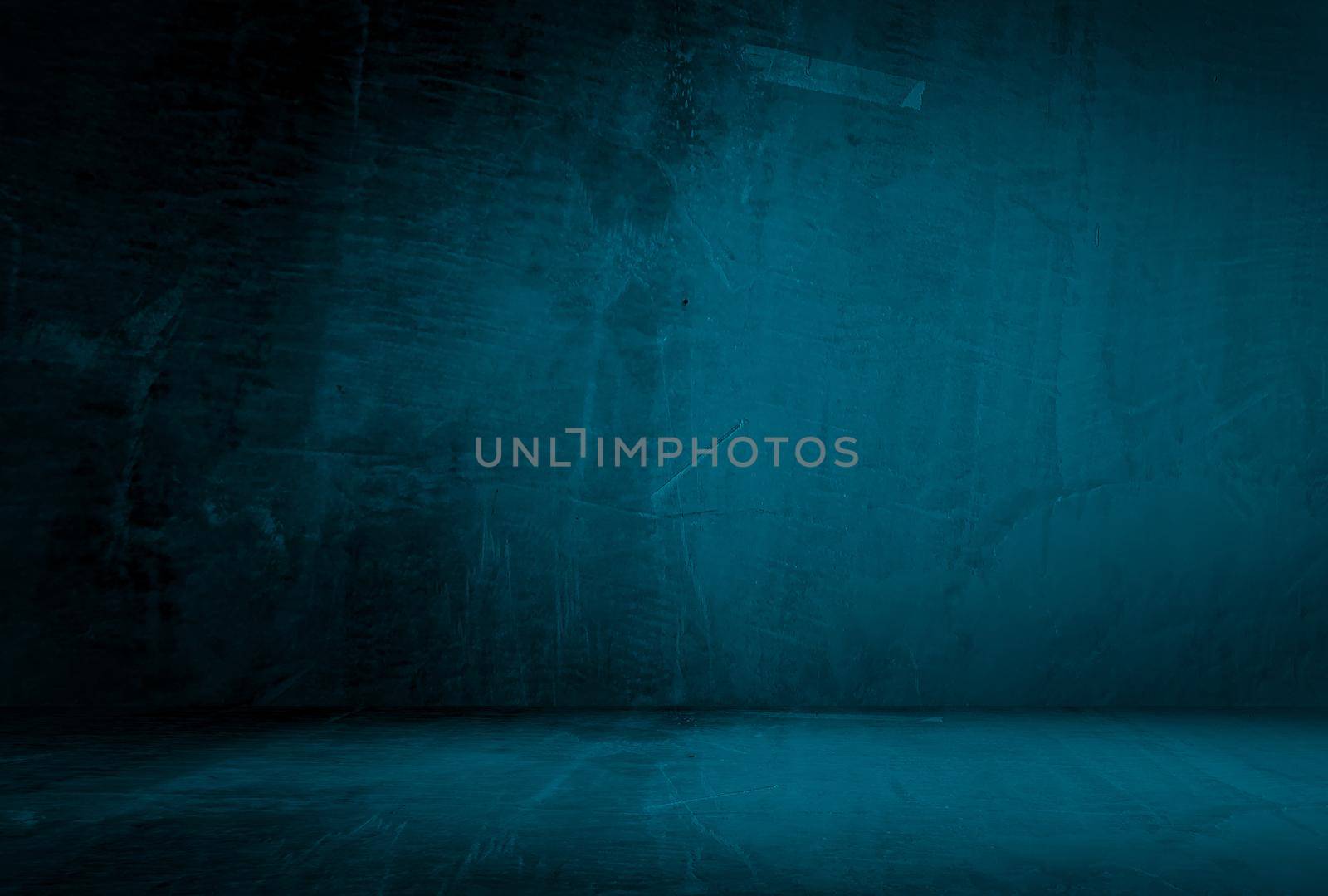 Vintage grunge blue concrete texture studio wall background with vignette