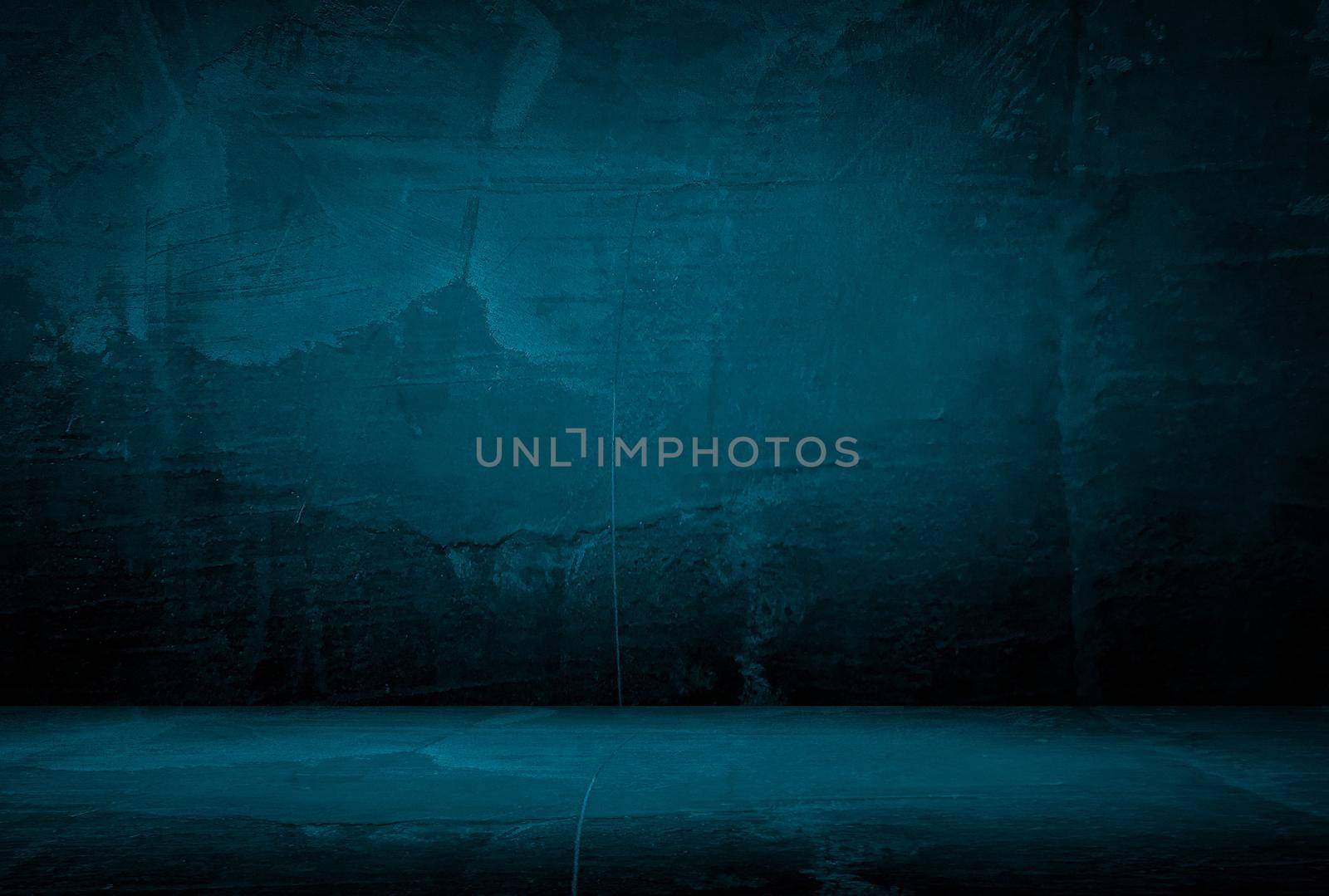 Vintage grunge blue concrete texture studio wall background with vignette. by Benzoix