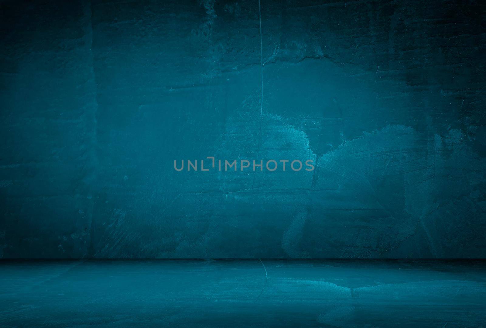 Vintage grunge blue concrete texture studio wall background with vignette. by Benzoix