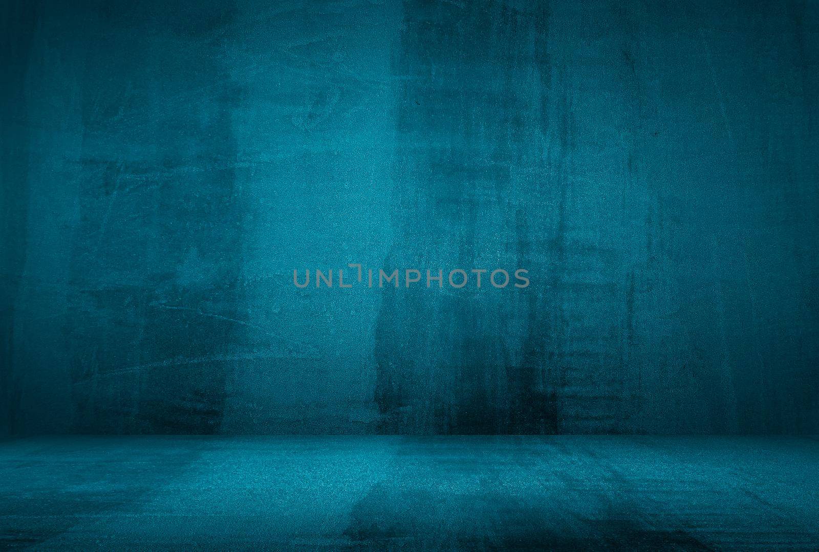 Vintage grunge blue concrete texture studio wall background with vignette