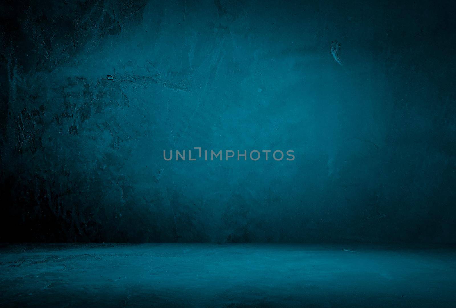 Vintage grunge blue concrete texture studio wall background with vignette. by Benzoix