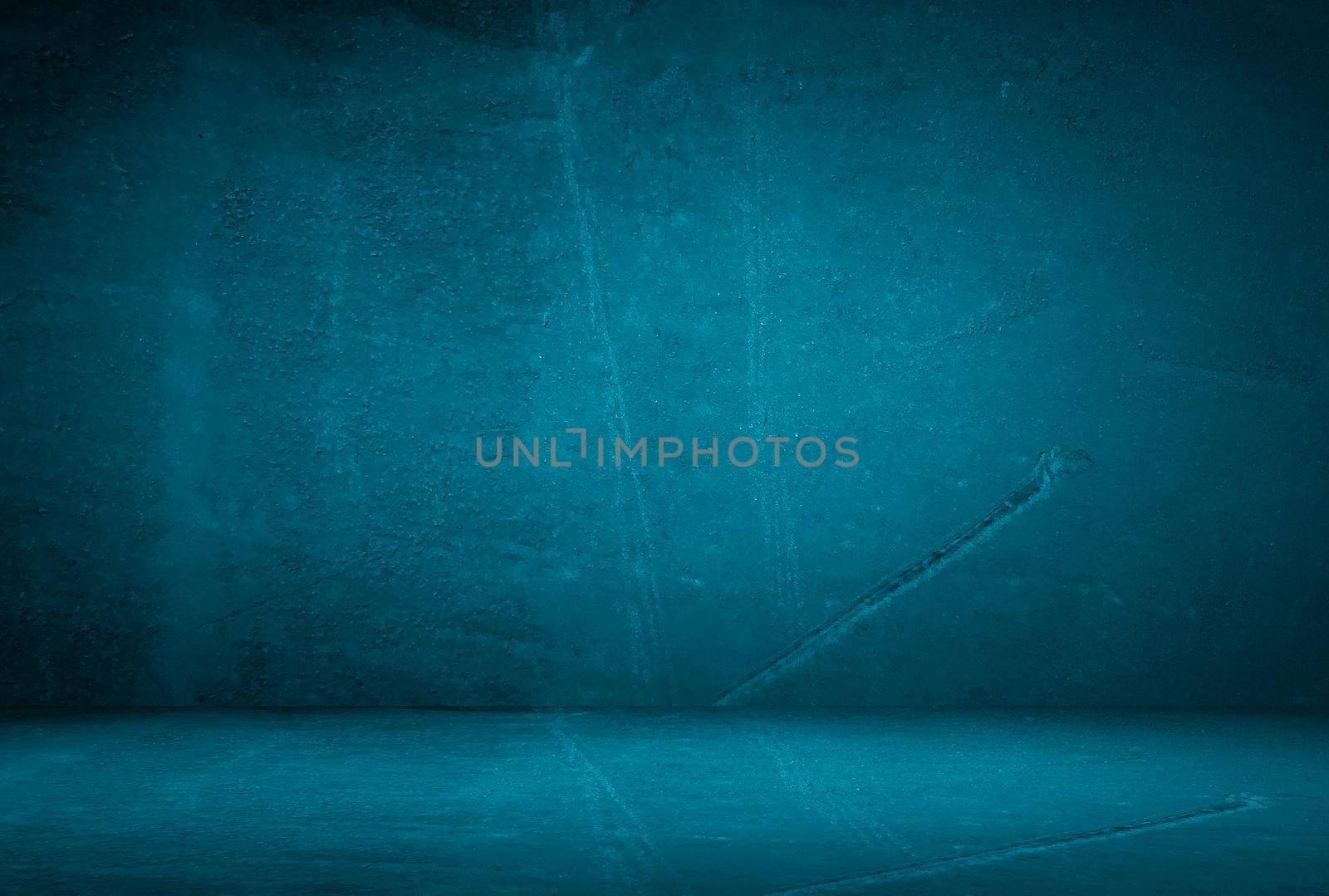 Vintage grunge blue concrete texture studio wall background with vignette