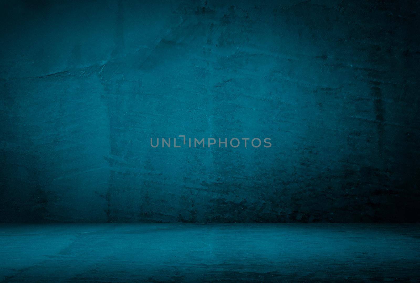 Vintage grunge blue concrete texture studio wall background with vignette