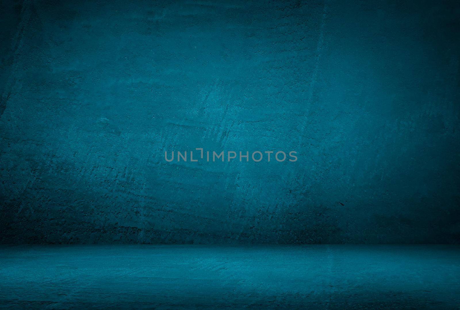 Vintage grunge blue concrete texture studio wall background with vignette. by Benzoix