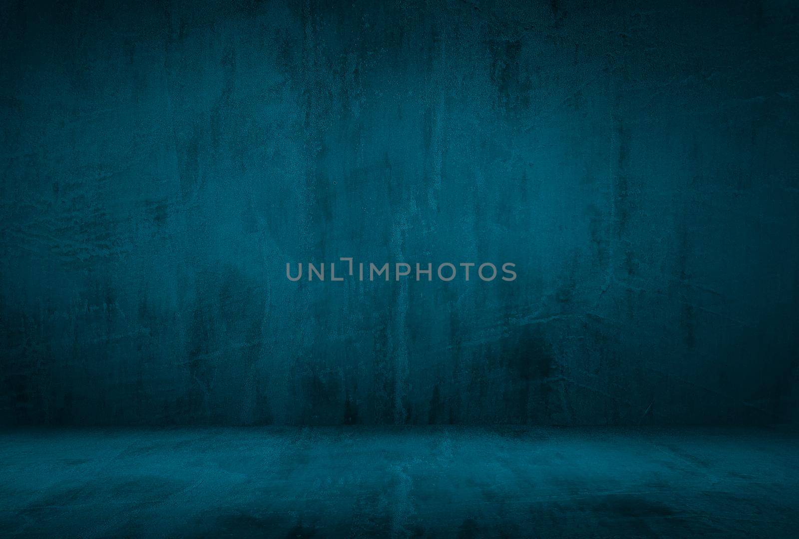 Vintage grunge blue concrete texture studio wall background with vignette. by Benzoix