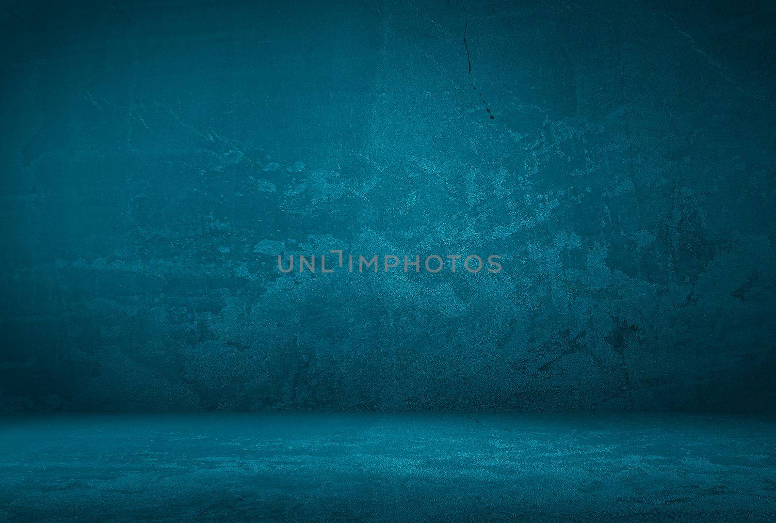 Vintage grunge blue concrete texture studio wall background with vignette. by Benzoix