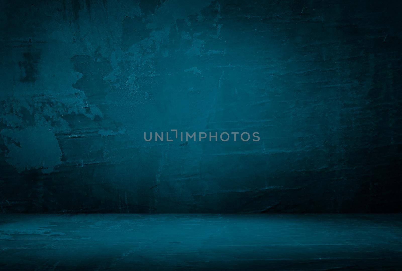 Vintage grunge blue concrete texture studio wall background with vignette