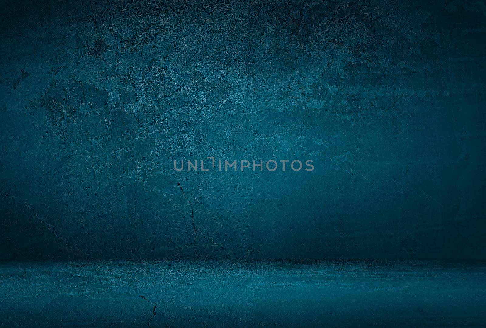 Vintage grunge blue concrete texture studio wall background with vignette