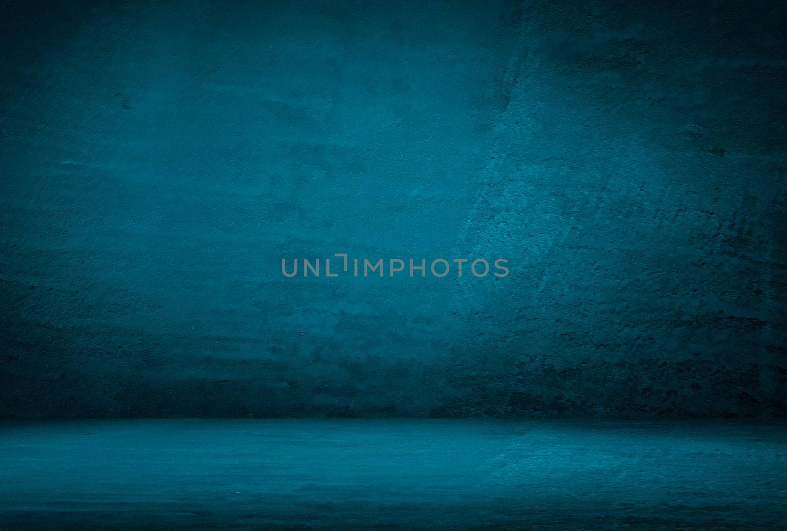 Vintage grunge blue concrete texture studio wall background with vignette. by Benzoix
