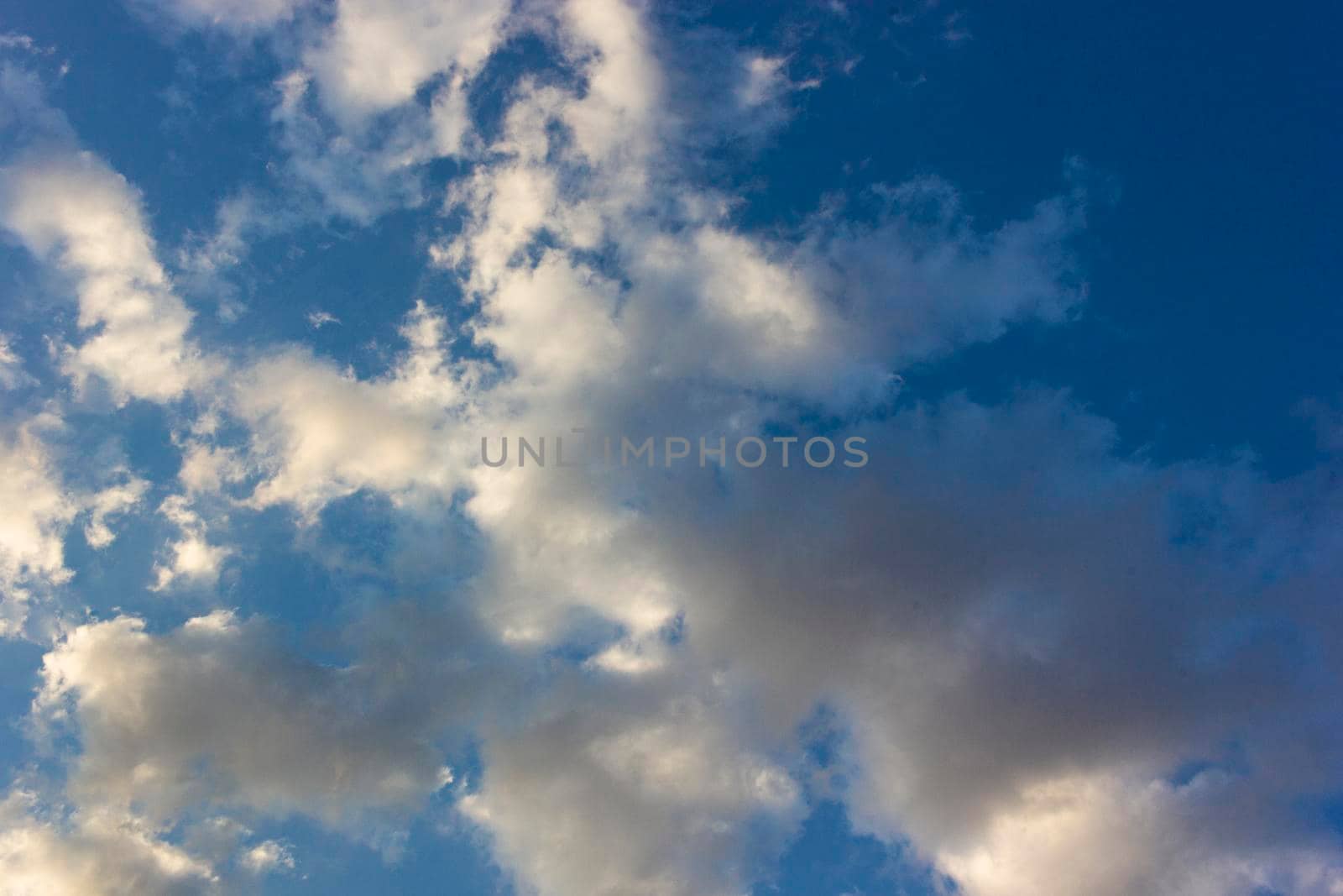 Blue sky full of fluffy clouds in southern of Spain by loopneo