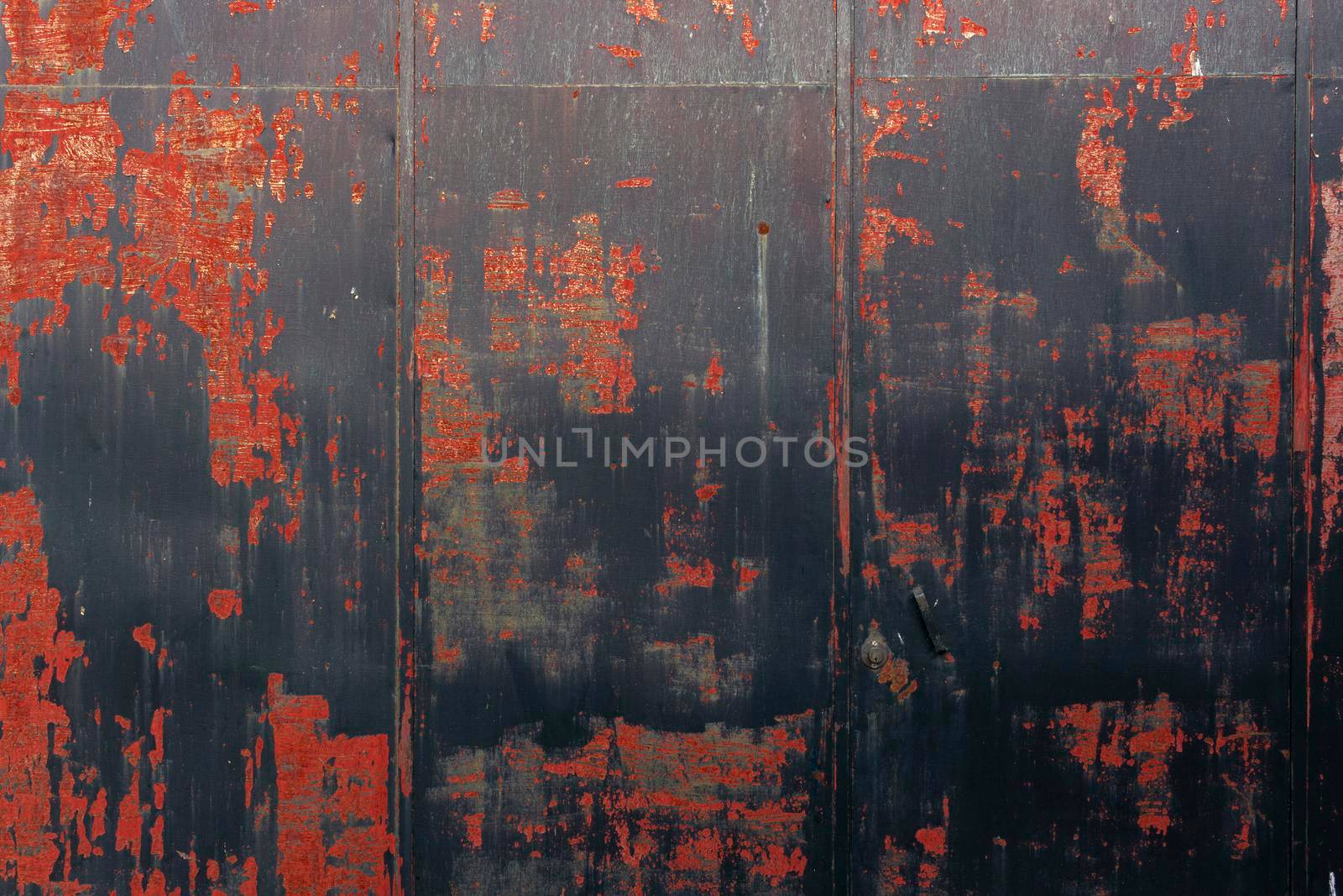 Metal of a metal door, weathered in southern Andalusia, Spain