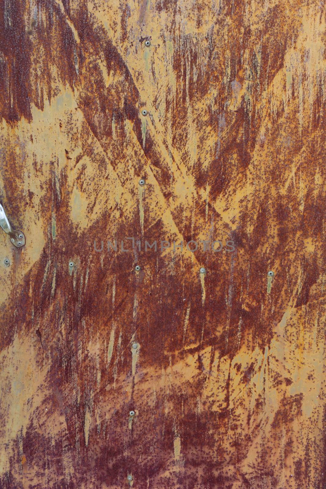 Metal of a metal door, weathered in southern Andalusia, Spain