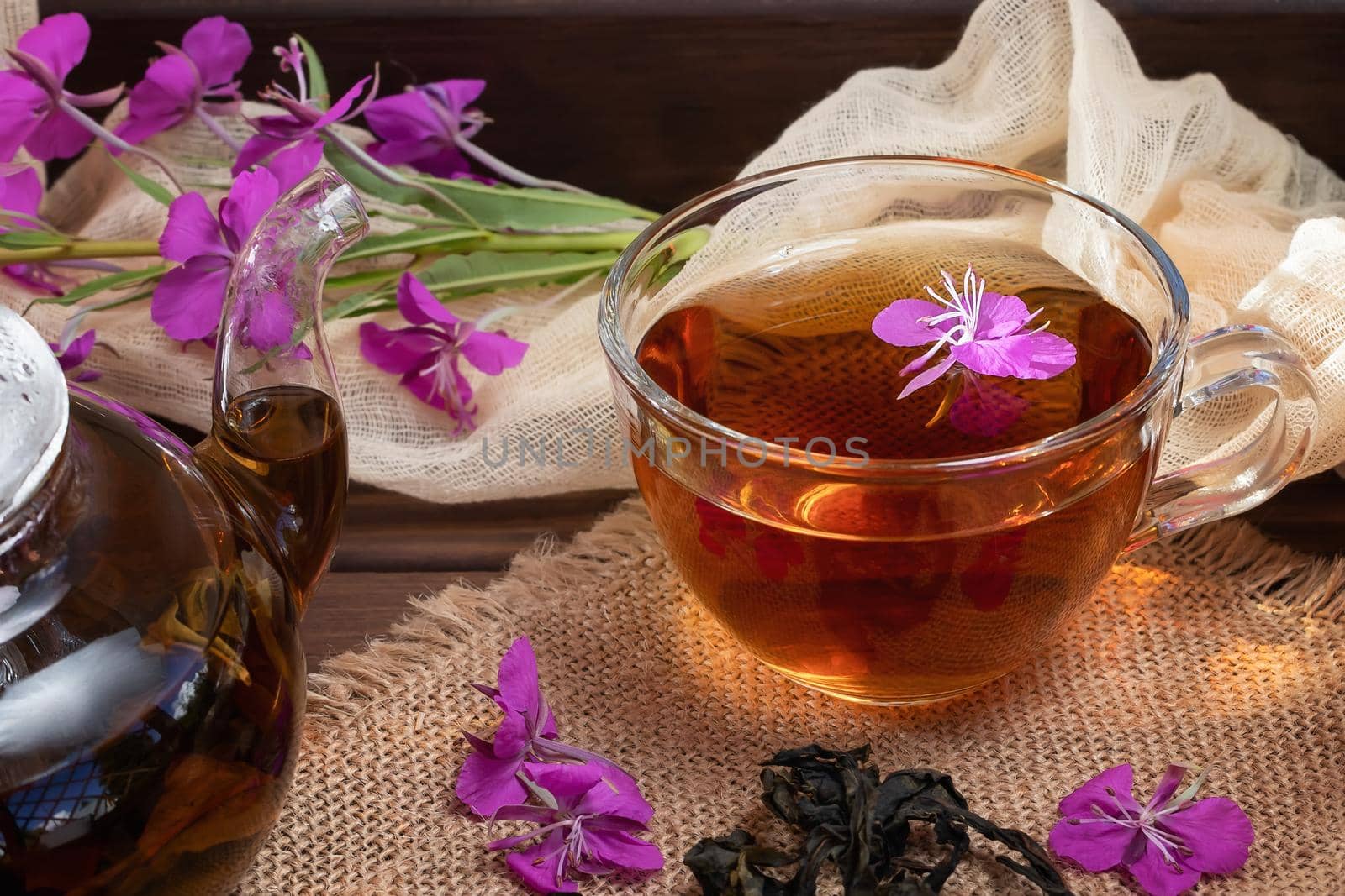 Herbal tea made from fireweed known as blooming sally in teapot and cup.