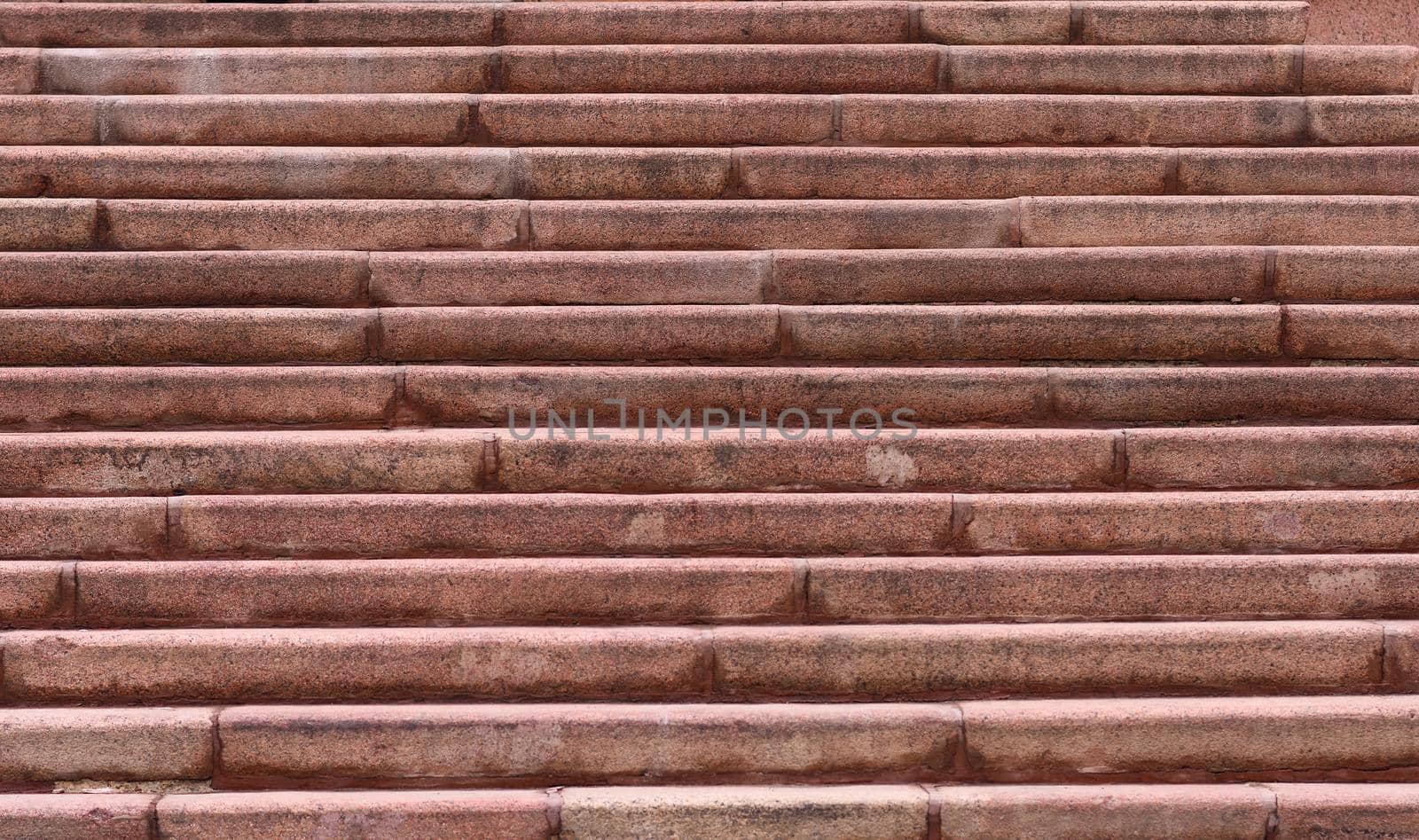 Old stone staircase, textured background, up and down. close up.