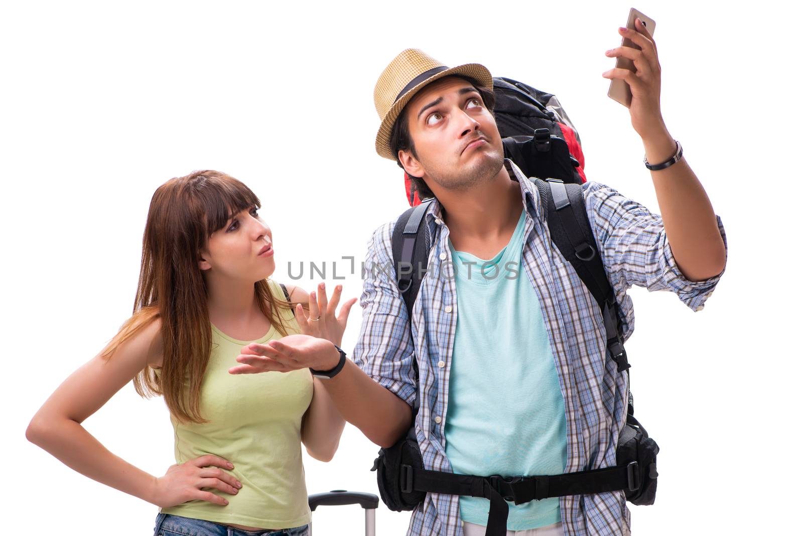 Young family preparing for vacation travel on white