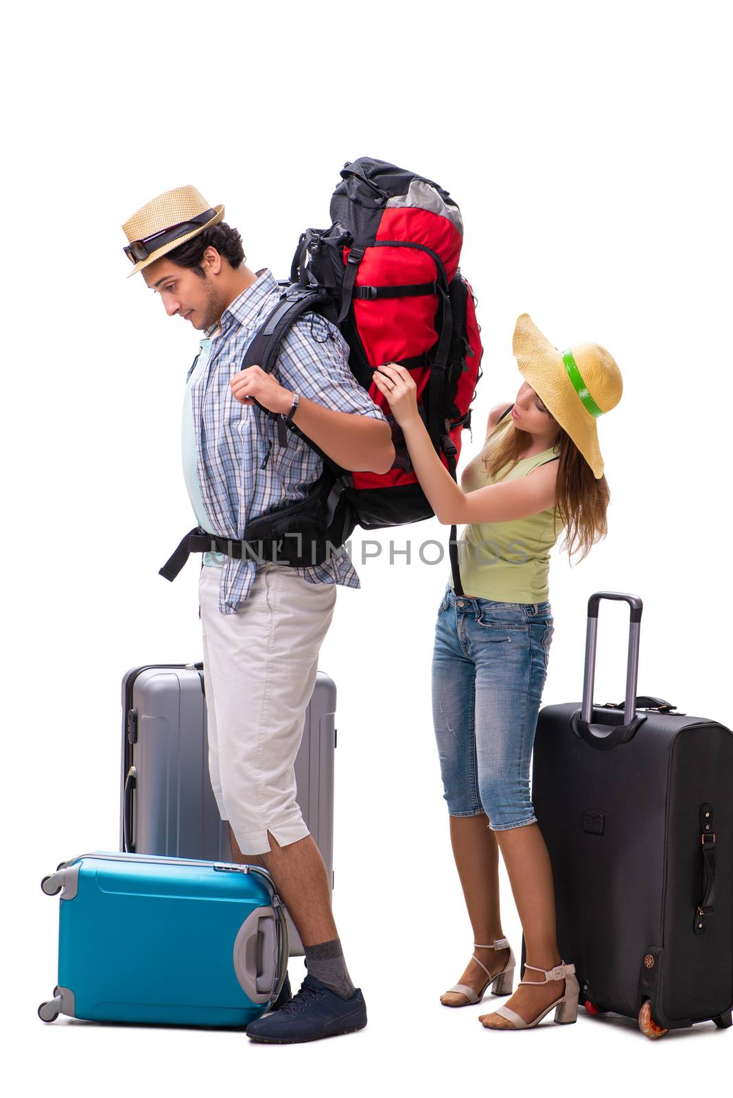 Young family preparing for vacation travel on white