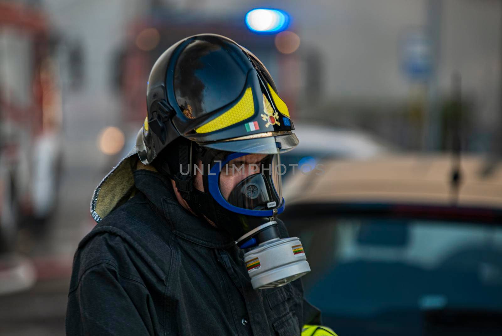 Close up of Firefighter with gas mask during emergency work