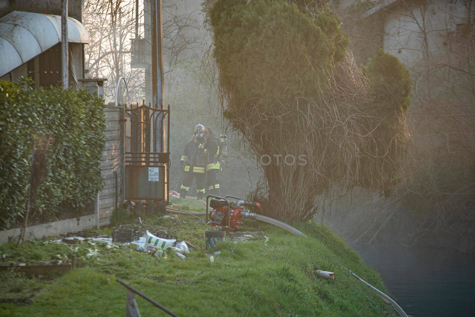 Firefighters at work in a domestic fire emergency