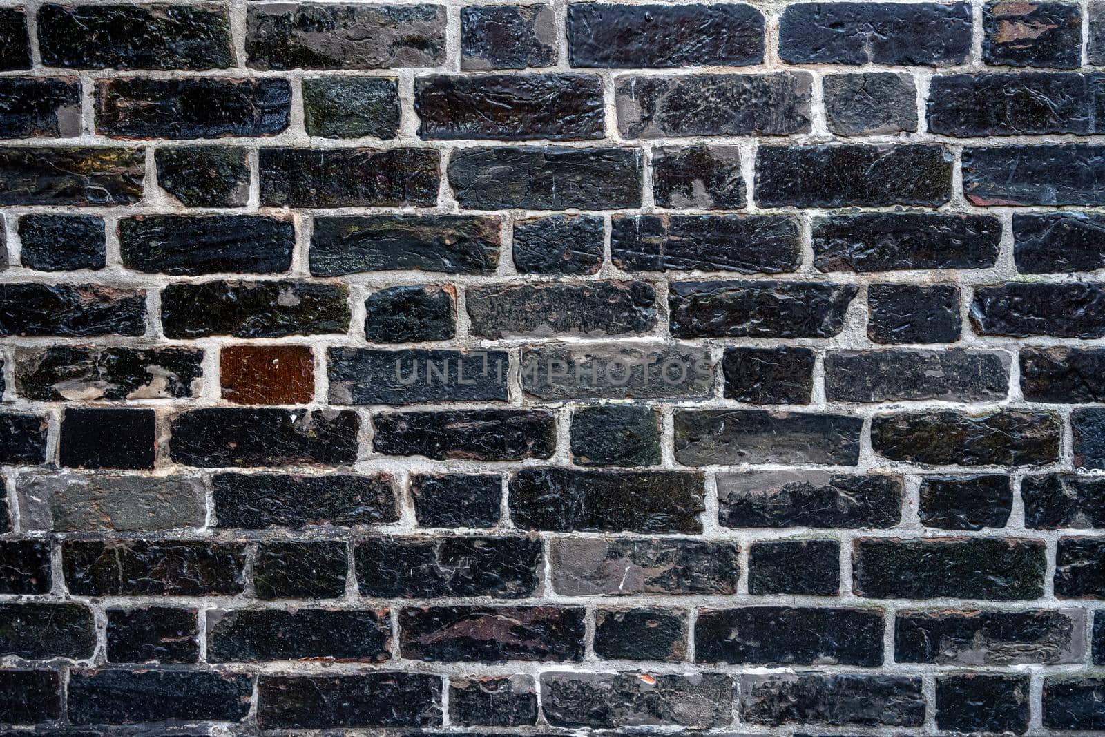 Background from a carbon black brick wall