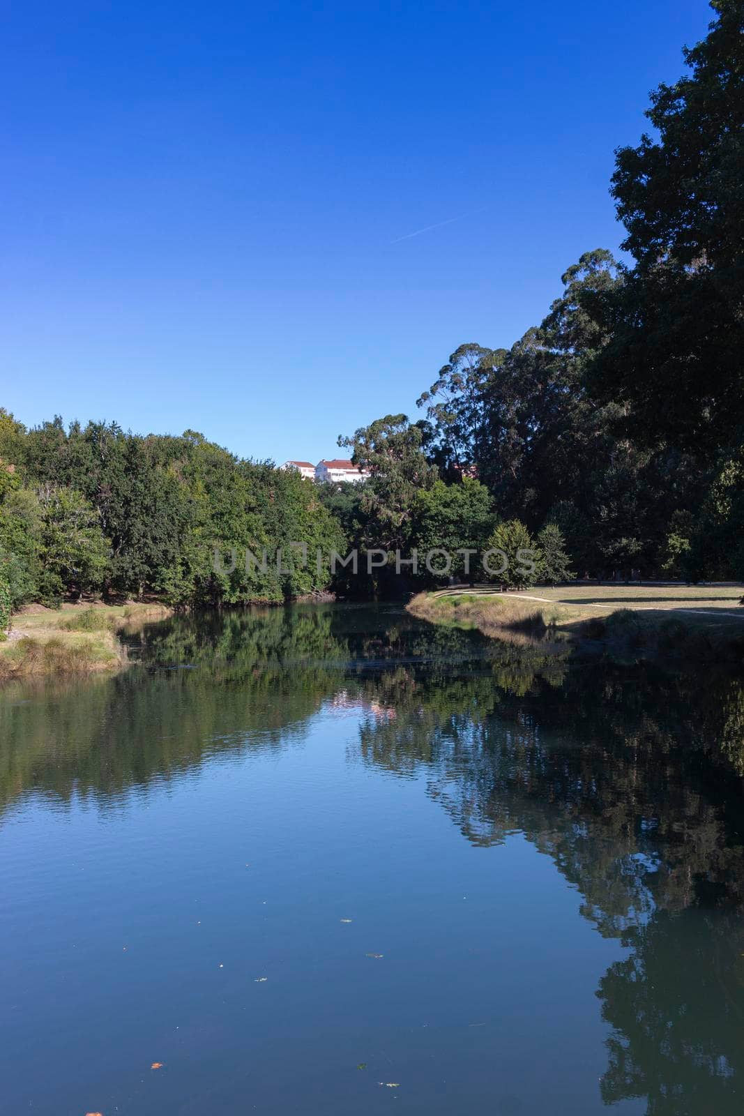 river in the city of pontevedra in galicia, spain by loopneo