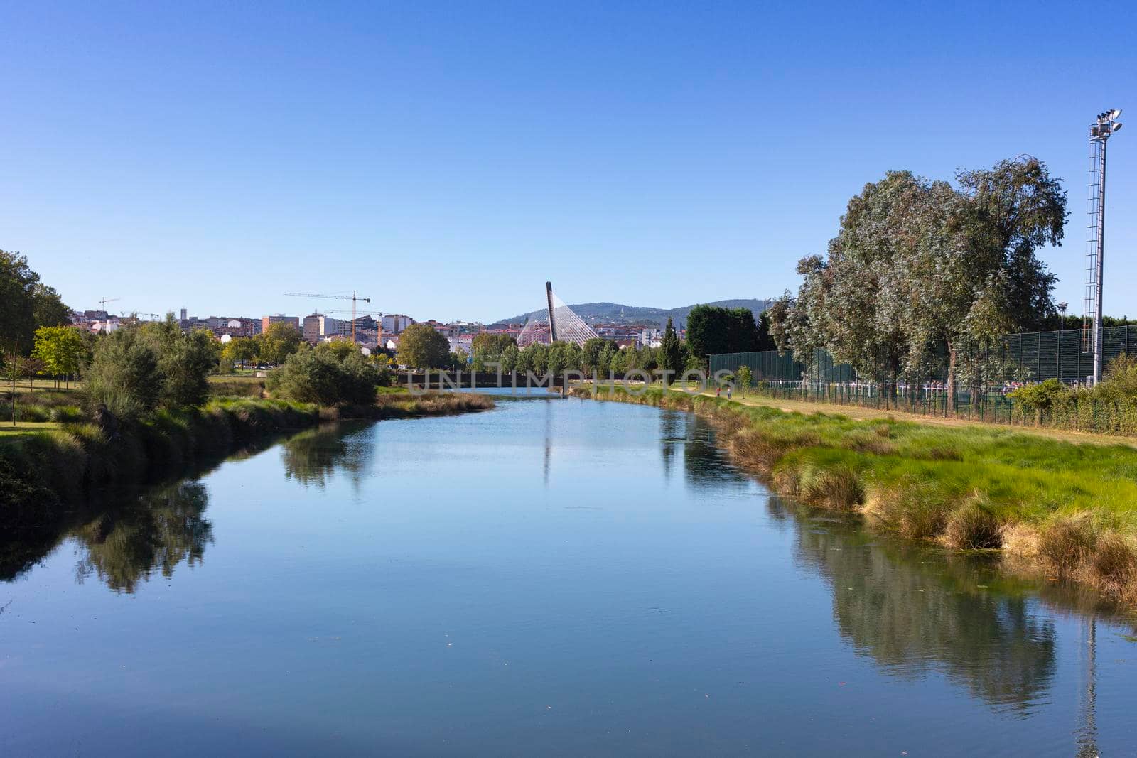 river in the city of pontevedra in galicia, spain by loopneo