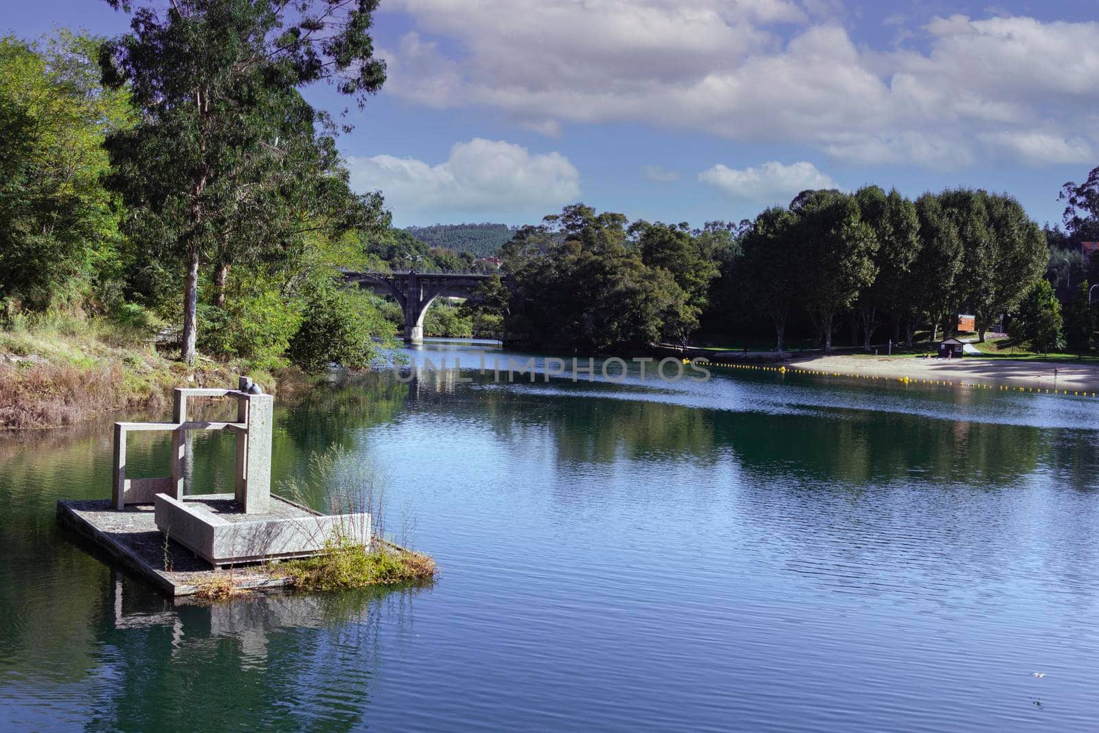 river in the city of pontevedra in galicia, spain by loopneo