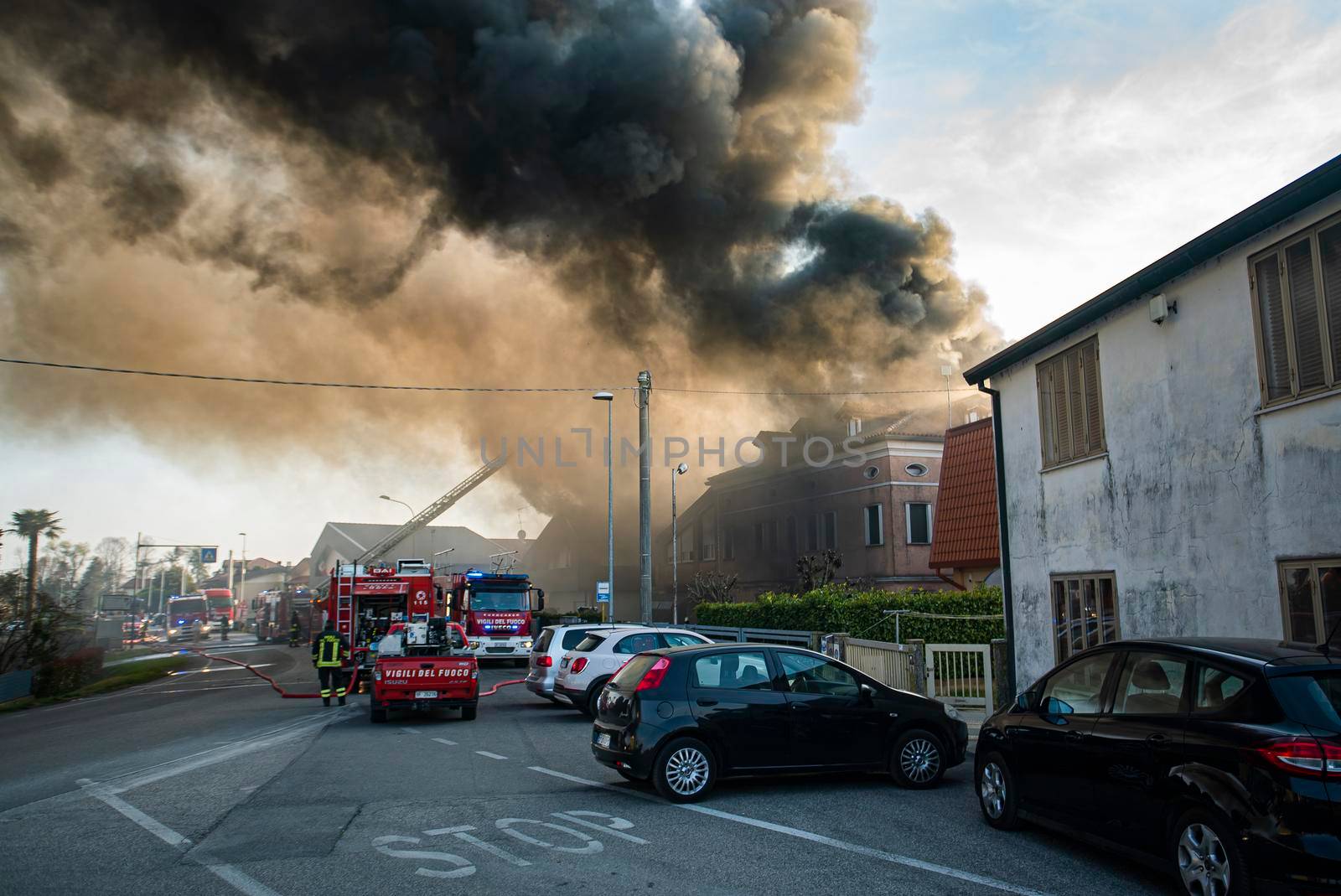 VILLANOVA DEL GHEBBO, ITALY 23 MARCH 2021: Fire house firefighters smoke