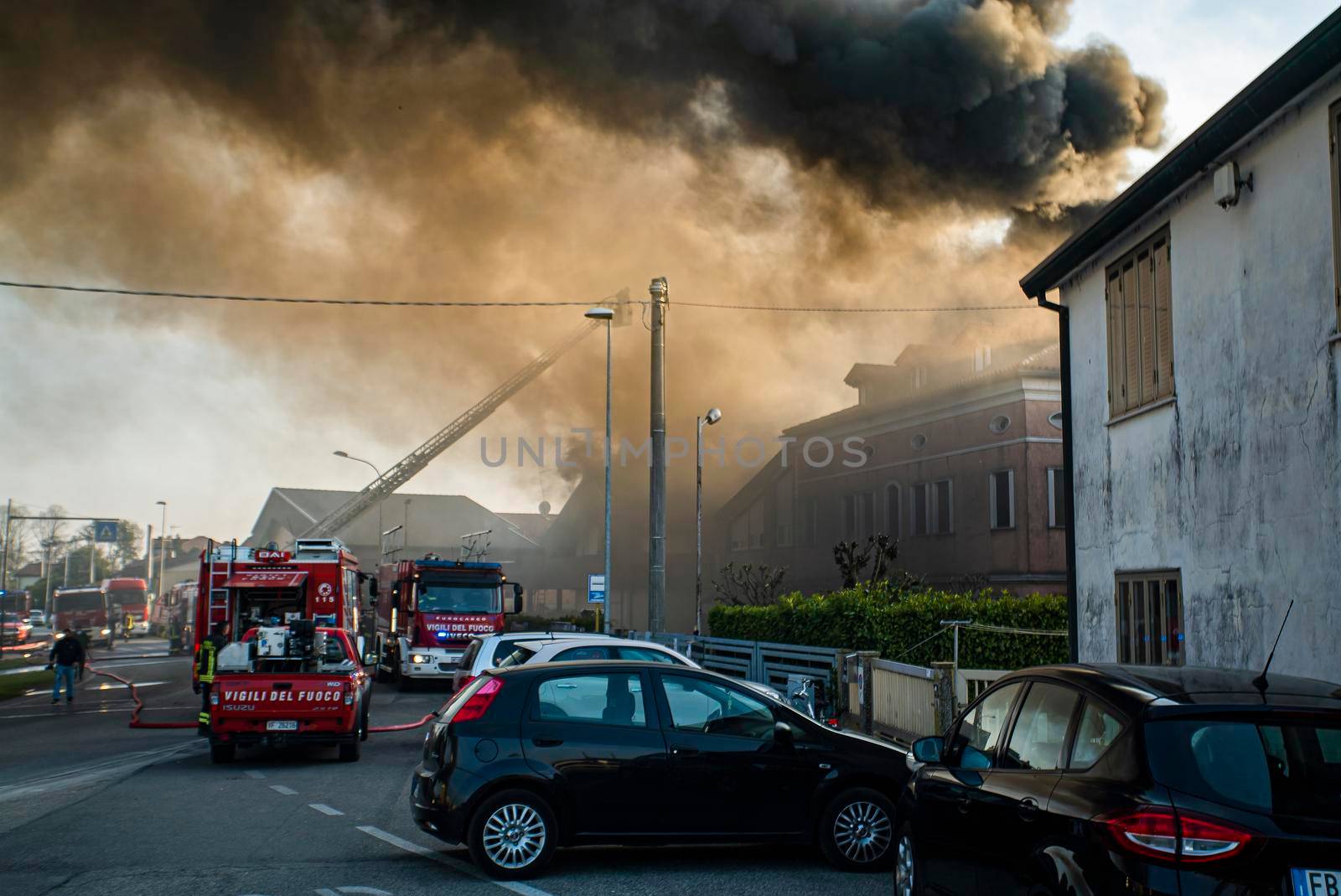 VILLANOVA DEL GHEBBO, ITALY 23 MARCH 2021: Fire house firefighters smoke