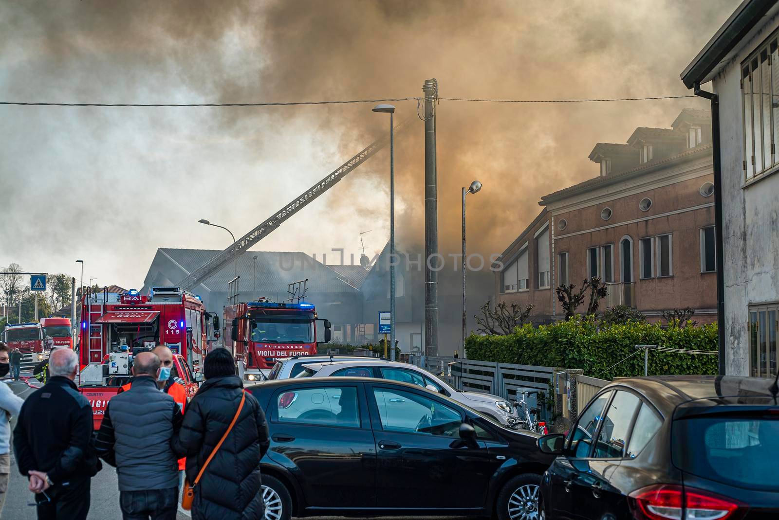 VILLANOVA DEL GHEBBO, ITALY 23 MARCH 2021: Fire house firefighters smoke