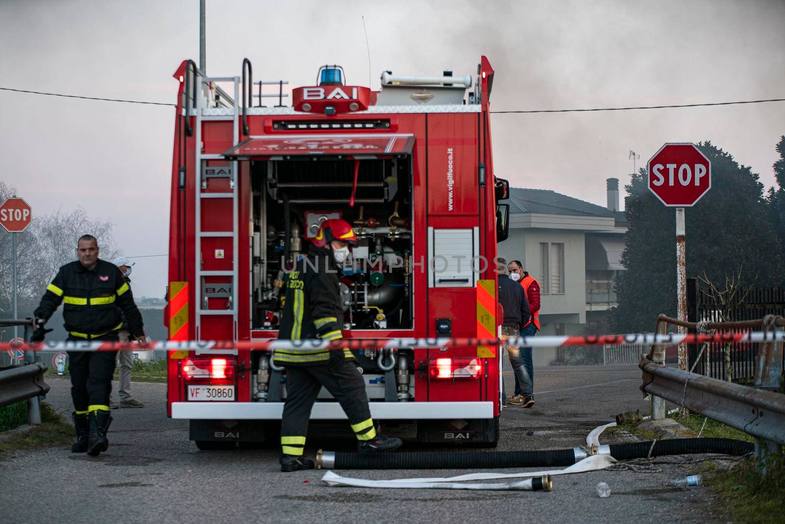 VILLANOVA DEL GHEBBO, ITALY 23 MARCH 2021: Firefighters with the truck