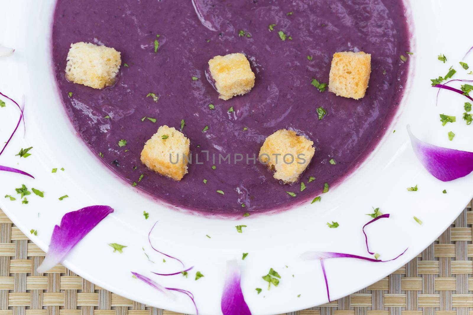 Creamy Sweet potato soup with beautiful decoration. Copy Space