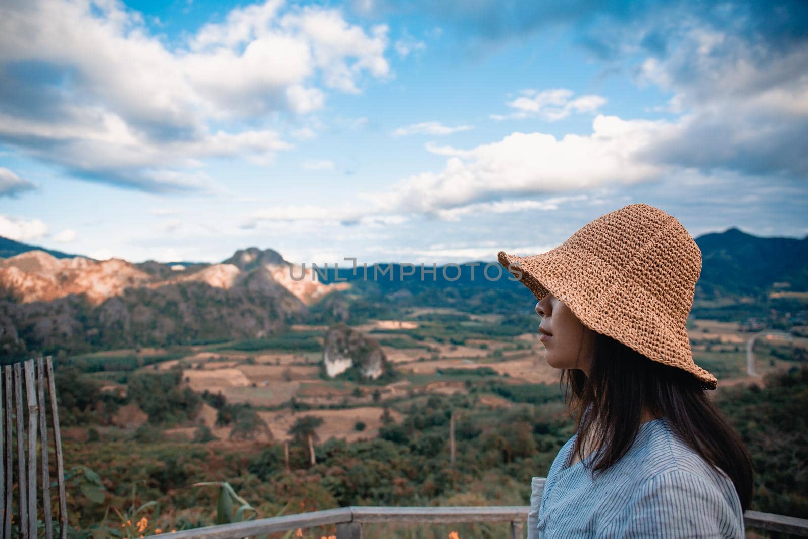 Woman standing on Phu Lang Ka, Phayao in Thailand.